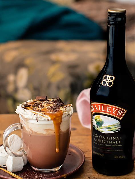 I heat up some milk until it just starts to simmer then turn off the heat. . How much baileys in hot chocolate